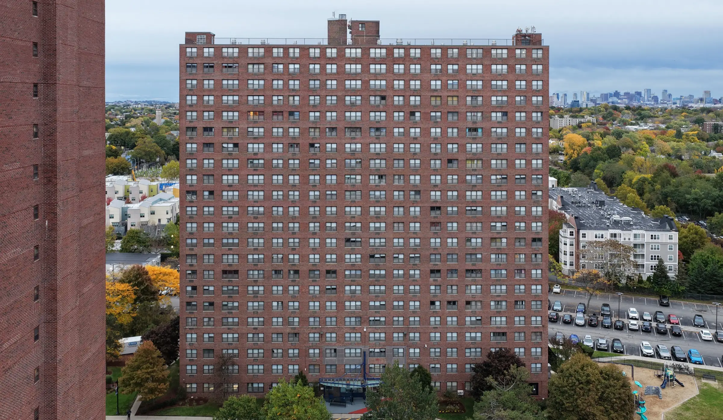 DJI Mavic drone inspecting the facade of a mid-rise building